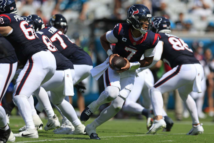Corey Perrine/Florida Times-Unio / USA TODAY NETWORK, Texans quarterback C.J. Stroud (7) looks to handoff during the third quarter of an NFL football matchup Sunday.